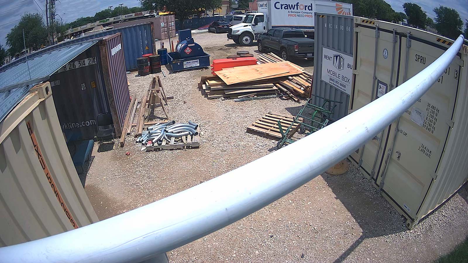 Construction site staging area with materials and equipment monitored by RVIN Overwatch